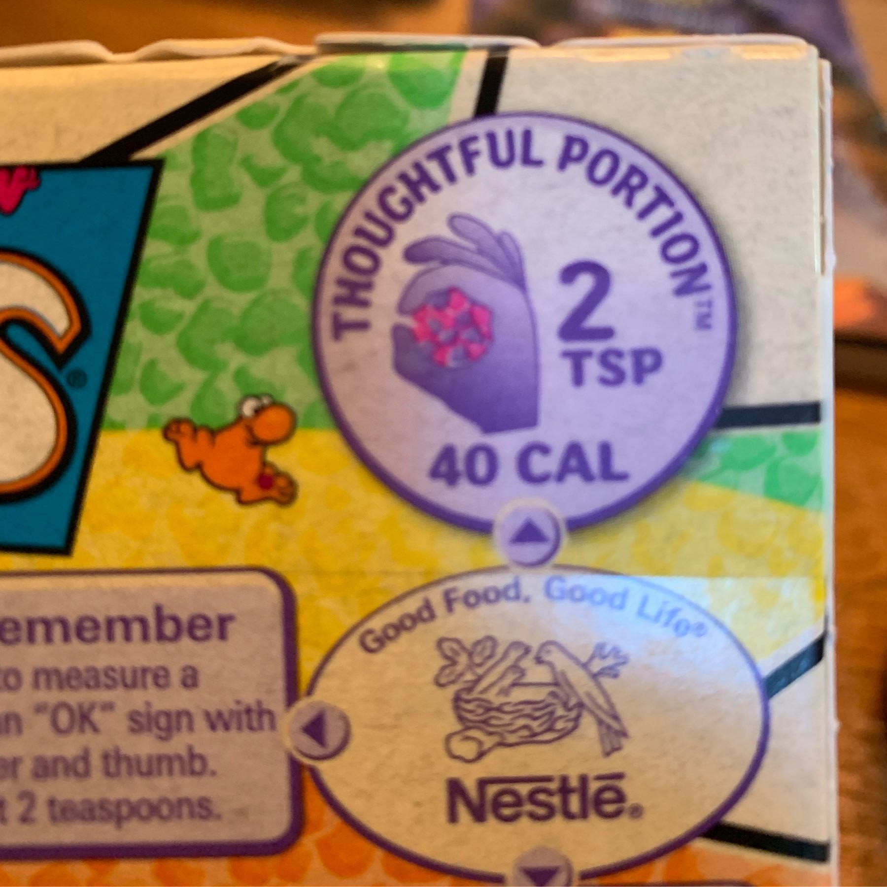 a picture of "A thoughful portion" on a box of Nerds candy. 2 tsp. 
